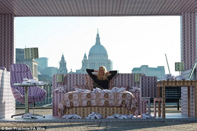 This cash hotel room on London's South Bank was made by IHG Rewards Club to illustrate how travellers could save millions by booking directly.