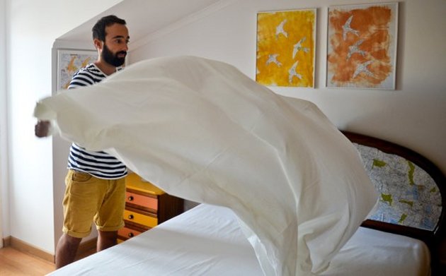 A law in Portugal will force renters like André Penin to register their apartments with local municipalities. Photo: Patricia de Melo Moreira for The New York Times