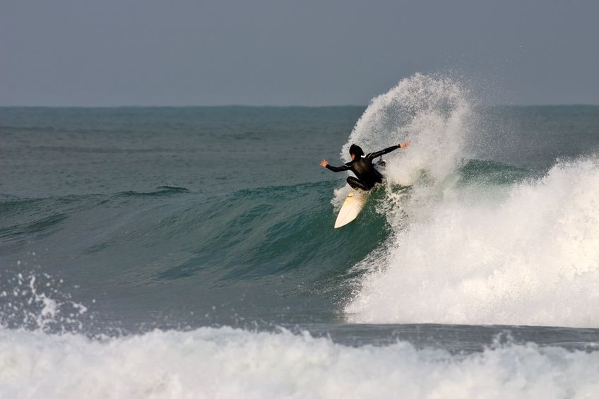 Surfer Kickback; © ClipDealer